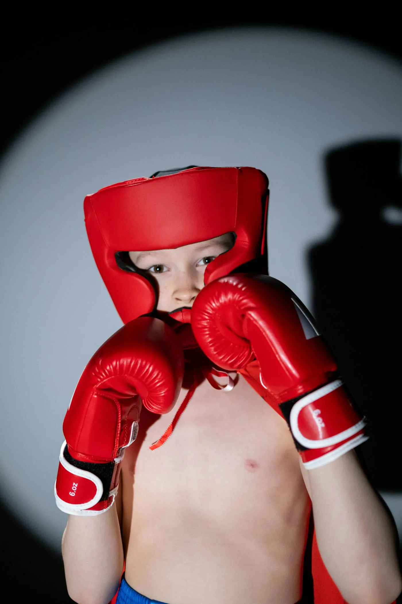 Young boxer learning technique